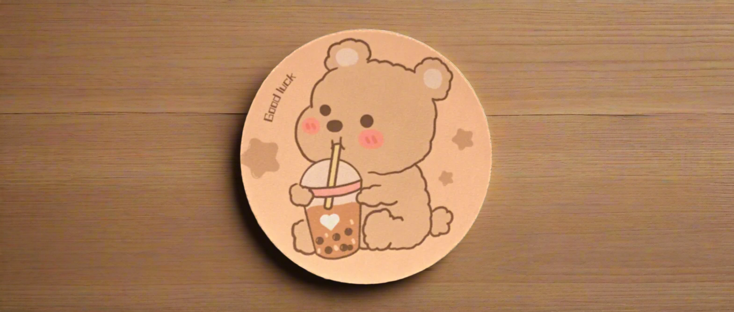 Boba Bear Coaster featuring an irresistibly cute light brown bear with pink cheeks, enjoying a delicious cup of boba.