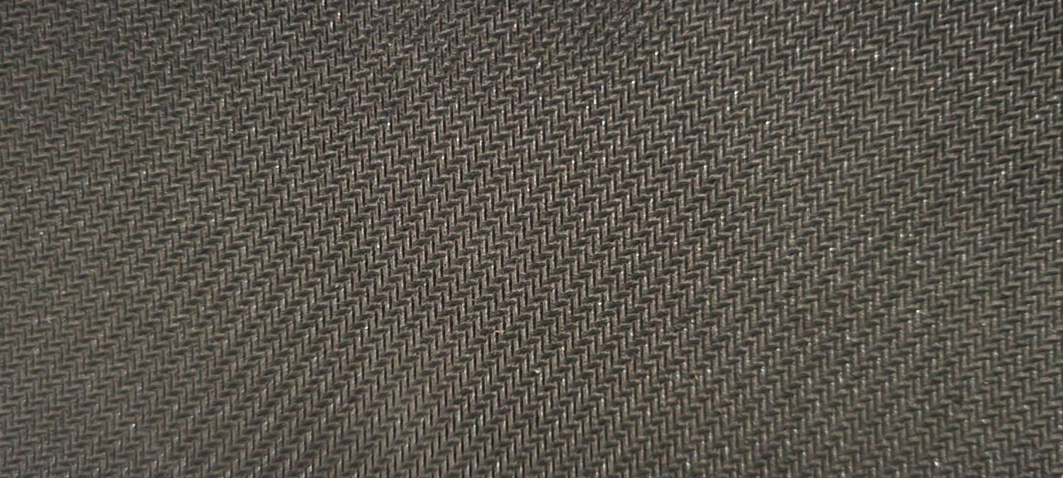 Close-up of the non-slip base of the Kuzeno Gaming Mousepad, ensuring a stable and secure grip on your desk during intense gaming sessions.