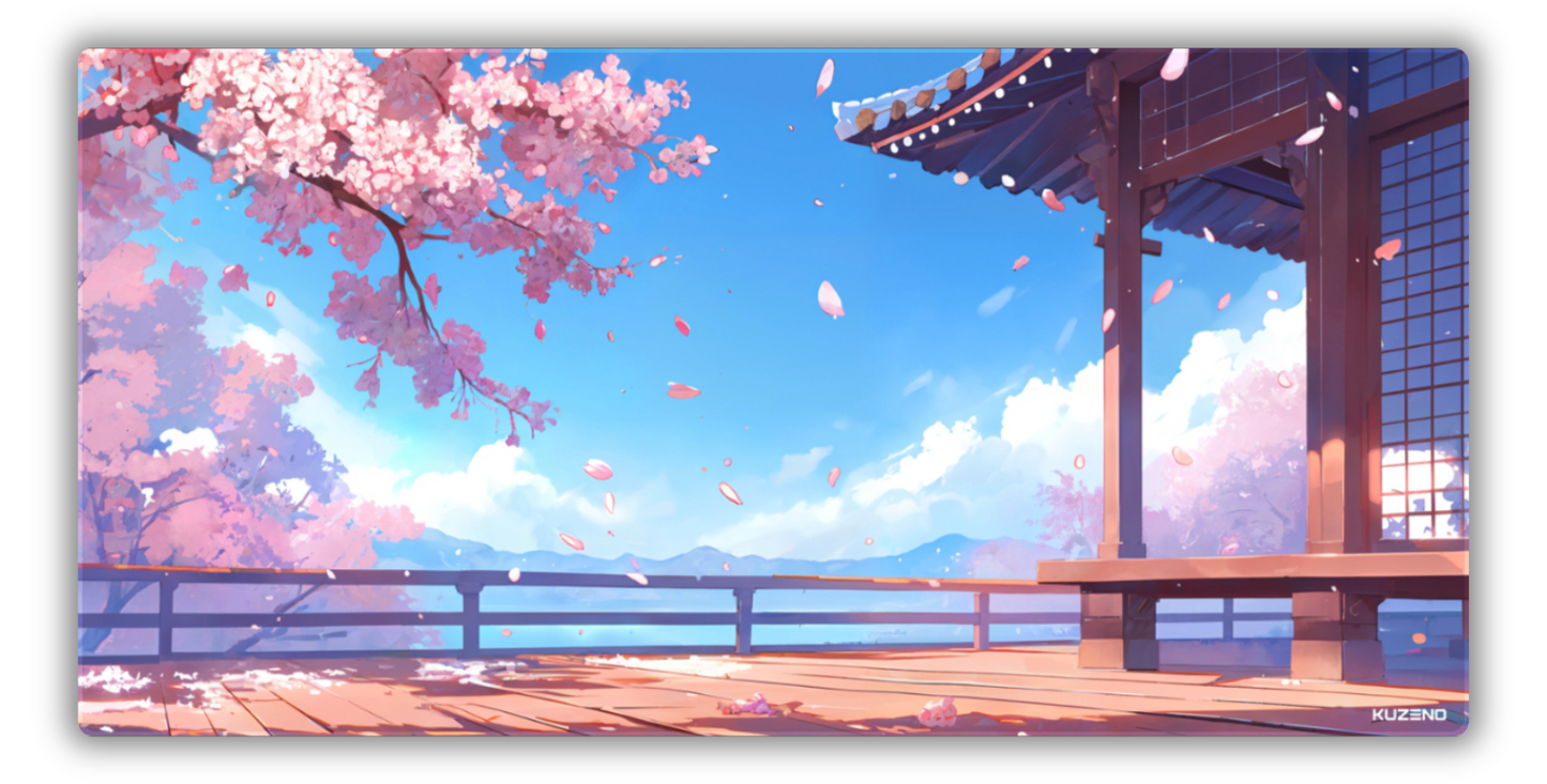 Sakura Skies gaming mousepad featuring blooming cherry blossoms, a traditional pagoda, and serene mountains beneath a clear sky, creating a peaceful and calming atmosphere.