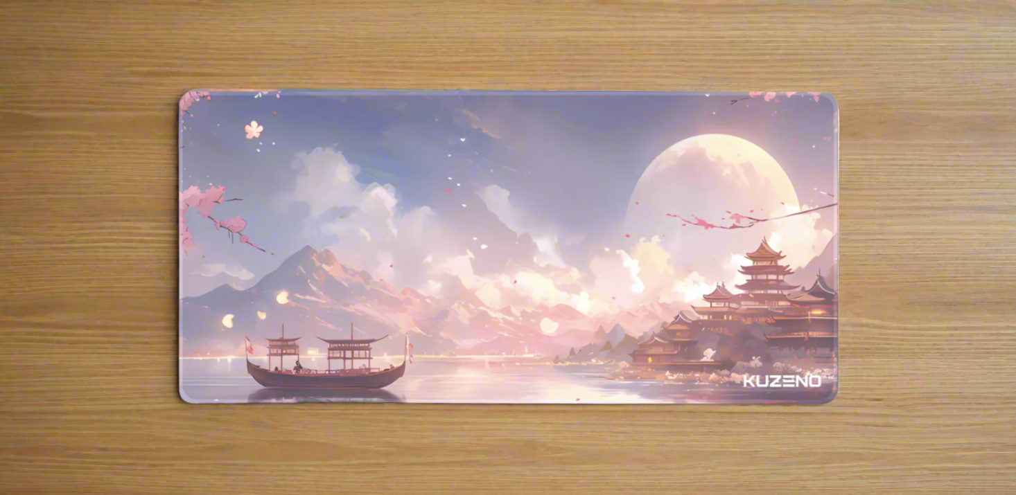 Blossom Bay Kuzeno Gaming Mousepad displayed on a wooden desk, featuring a serene cherry blossom scenery for a calming and elegant workspace.