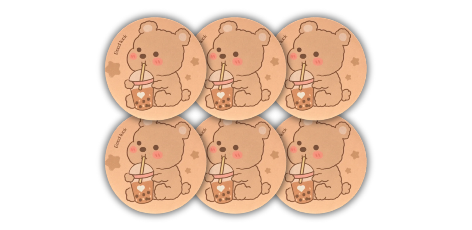 Boba Bear Coaster 6-Pack, featuring cute light brown bears with pink cheeks, each enjoying a cup of boba. Perfect for adding a fun and playful touch to your home or office.