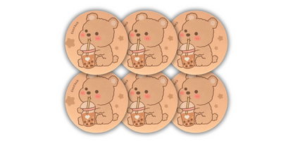 Boba Bear Coaster 6-Pack, featuring cute light brown bears with pink cheeks, each enjoying a cup of boba. Perfect for adding a fun and playful touch to your home or office.